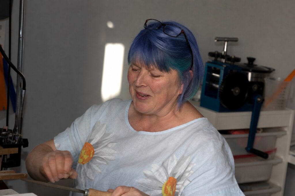Jo silversmith workbench Charlestown Jo working at her silversmithing bench in her Charlestown jewellery studio in Cornwall.